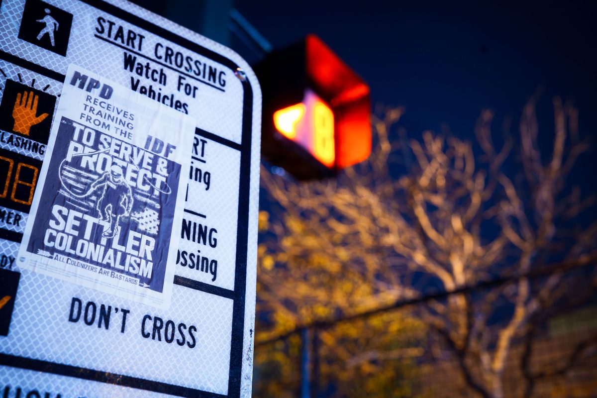 “MPD Trains with IDF” Sticker, Minneapolis Crosswalk Sign