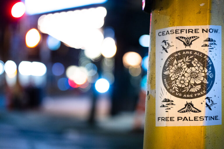 Ceasefire Now flyer in Minneapolis 4 A flyer wheat pasted to a poll in Minneapolis that reads "Ceasefire Now".