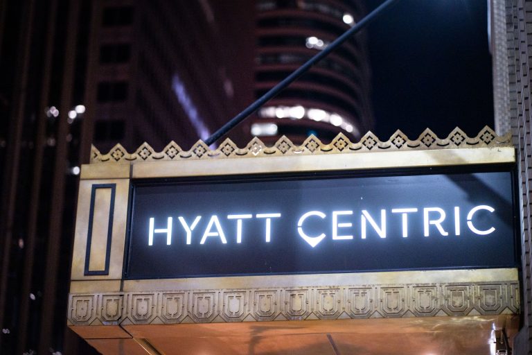 Hyatt Centric Marquee, Downtown Minneapolis 4 Hyatt Centric hotel illuminated sign with decorative gold trim at night in downtown Minneapolis.