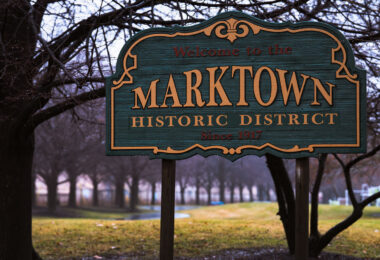 Welcome to Marktown, Indiana. Marktown is on the National Register of Historic Places.

The town was created by Clayton Mark, owner of the Clayton Mark and Company that made steel pipes, to house employees. The town is bordered by a US Steel plant and the largest BP refinery in the world. The town is known as the only town in North America where residents drive on the sidewalks and walk in the street.