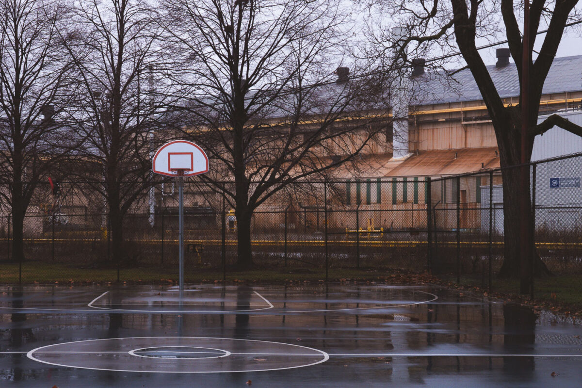 Marktown, Indiana Basketball Court Beside Industrial Buildings