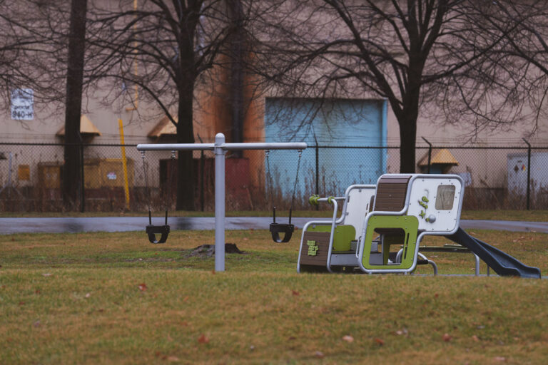 Playground equipment in Marktown, East Chicago, Indiana 4 Playground equipment in Marktown, East Chicago, Indiana, with industrial buildings in the background.