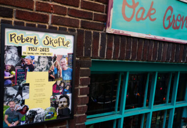 Memorial outside the Oak Grove Grocery in Minneapolis, which remains closed. Lots of photos and letters from friends and neighbors remembering Robert Skafte who was stabbed to death inside the store last week. Today a judge ordered a competency exam for the man charged in the murder.