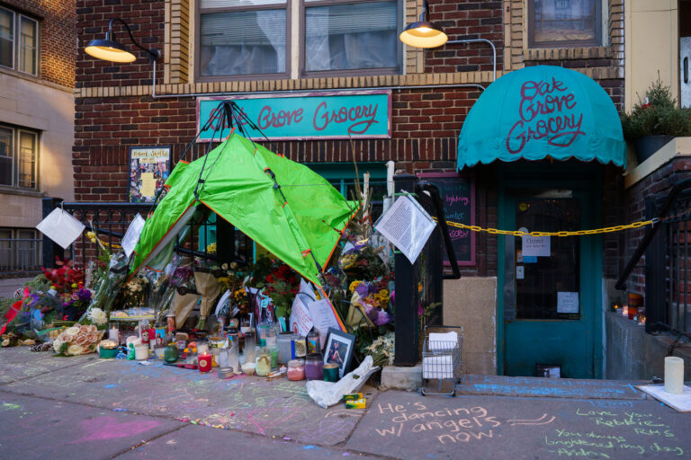 Robert Skafte Memorial in Minneapolis 1 Memorial outside the Oak Grove Grocery in Minneapolis, which remains closed. Lots of photos and letters from friends and neighbors remembering Robert Skafte who was stabbed to death inside the store last week. Today a judge ordered a competency exam for the man charged in the murder.