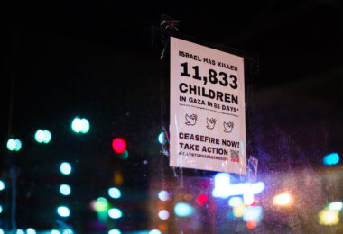 A "Ceasefire Now! flyer on a storefront in Uptown Minneapolis in January 2024.