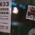 A sticker reading "Long live the intifada" on a Uptown Minneapolis storefront. January 2024.