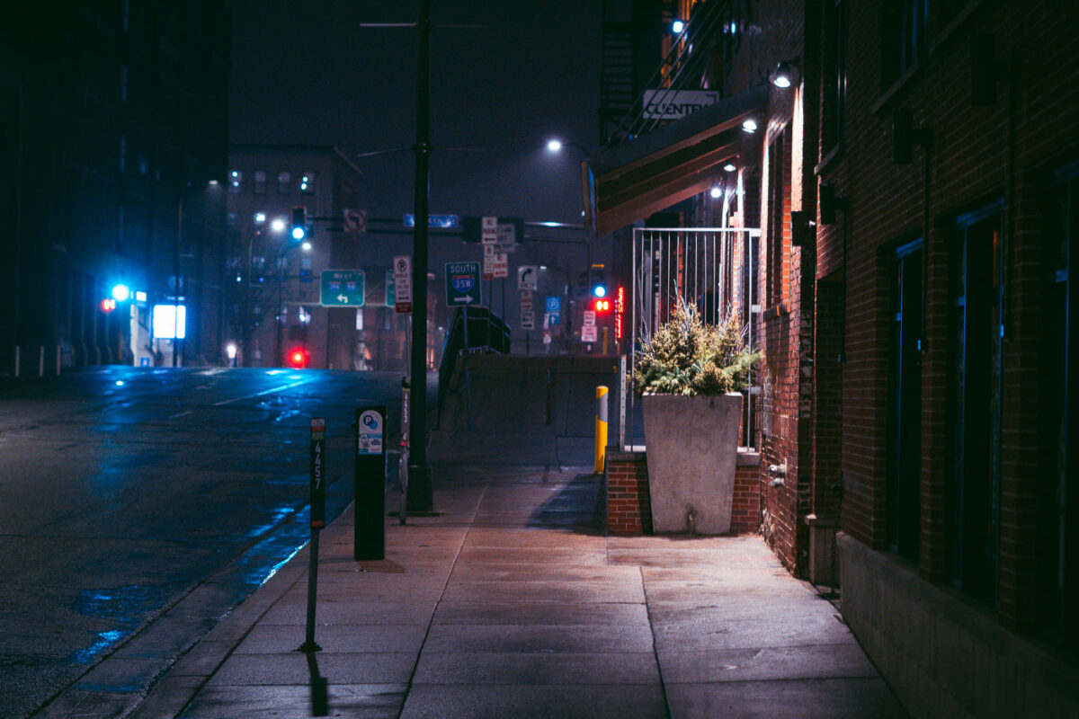 Night photo of wet sidewalk with rain January 24