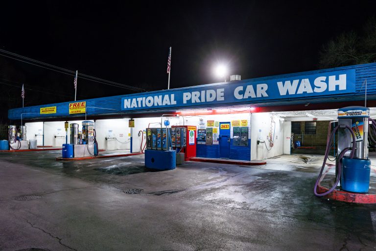 National Pride Car Wash, South Torrence Avenue, Chicago 4 National Pride Car Wash facility illuminated at night on South Torrence Avenue in Chicago.