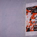 Flyers on the Martin Olav Sabo Bridge in South Minneapolis. Located a quarter mile quarter mile from the replacement 3rd precinct/"community safety center". After signing the purchase agreement last week, the city says the new building could be open in Q1 of 2025 - 5 years after it was burned. (Minneapolis, February 2024)