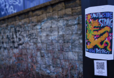 A flyer reading "Southside Strong No New Precinct!" found on the Midtown Greenway in February 2024.