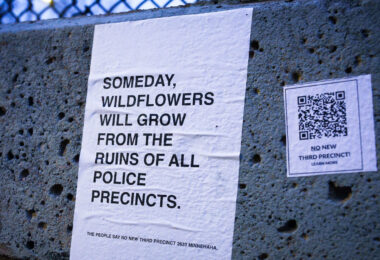 Flyers seen around the third precinct in South Minneapolis protesting the building of a replacement Minneapolis Police Third Precinct. Flyer reading "Someday, wildflowers will grow from the ruins of all police precincts".