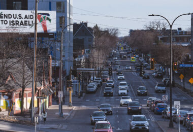 A billboard on Lyndale avenue from the Anti War Committee reading "End US Aid To Israel!"