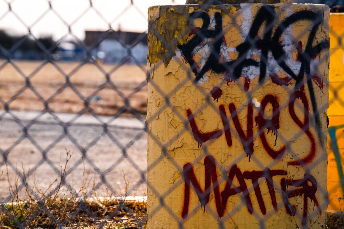 Black Lives Matter written on a light post in South Minneapolis, March 2024.