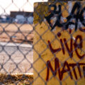Black Lives Matter written on a light post in South Minneapolis, March 2024.