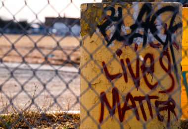 Black Lives Matter written on a light post in South Minneapolis, March 2024.