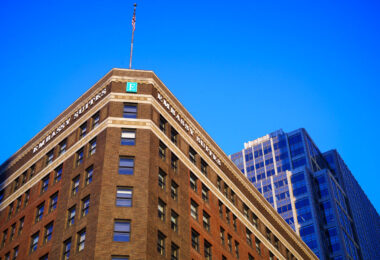An American Flag on top of the Embassy Suites hotel in downtown Minneapolis.