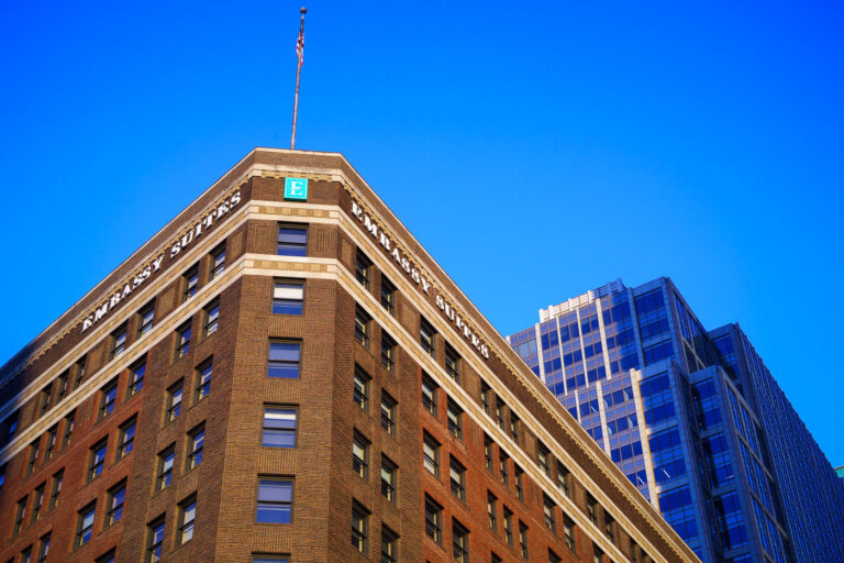 Flag on top of Embassy Suites 4 An American Flag on top of the Embassy Suites hotel in downtown Minneapolis.