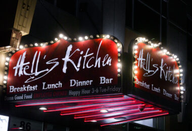 The lit up Hell's Kitchen sign on 9th Street in downtown Minneapolis.