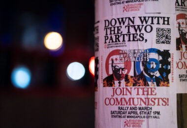 A flyer by "Revolutionary Communists of America" advertising a rally and march to take place Saturday April 6th, 2024 in downtown Minneapolis.