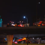 Trucks doing snow removal on Interstate 394 near downtown Minneapolis.