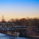 The Northstar Line makes it's way over the Mississippi River near downtown Minneapolis. March 2024.