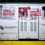 A train with Bank of America Boston Marathon wrap.
