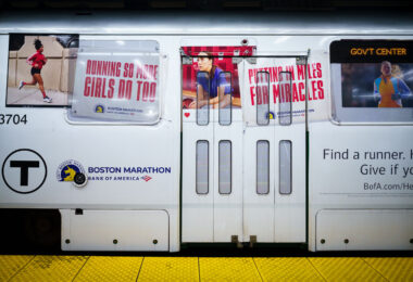 A train with Bank of America Boston Marathon wrap.