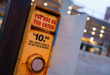 A box that reads "Pay box as you enter" "$10.00 Add'l service charge if fee not paid in advance"
