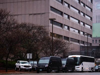 Buses and Vans Outside Hennepin County Government Center