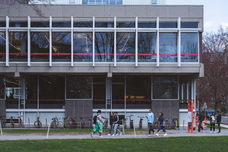 Harvard Science Center, Cambridge, Massachusetts 2 The Harvard Science Center, completed in 1972 and designed by Josep Lluís Sert, exemplifies mid-century modernist architecture within Harvard’s historic campus. Its concrete frame and ribbon-window façade reflect Sert’s functionalist style, emphasizing natural light and open interior spaces for teaching and research. Situated near Harvard Yard, the building houses classrooms, laboratories, and lecture halls serving the university’s science departments. In the photo, students and visitors walk along the adjacent green, with rows of bicycles lined beneath the structure—an everyday scene that captures the energy and rhythm of life in Cambridge’s academic core.
