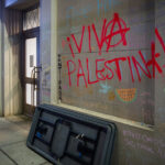 Graffiti outside of Coffman Memorial Union where pro-Palestinian protesters have been gathering to protest the war in Gaza.