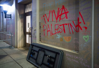 Graffiti outside of Coffman Memorial Union where pro-Palestinian protesters have been gathering to protest the war in Gaza.