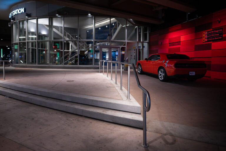 Security guard parking at I-35/Lake Station 4 The I-35W./Lake Street Transit Station with the security guard's car parked out front.