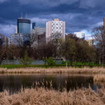 Storm clouds roll over Minneapolis as seen from Loring Pond near Downtown.