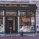 Students outside the Harvard Book Store at Harvard University.