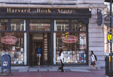 Students outside the Harvard Book Store at Harvard University.