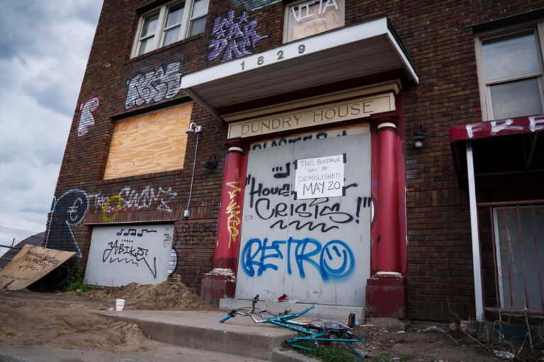 Dundry House in Minneapolis 3 A sign on the front of the "Dundry House" in Minneapolis. It reads "this building will be demolished May 20". The building was destroyed by fire in April 2024. The building had been vacant.
