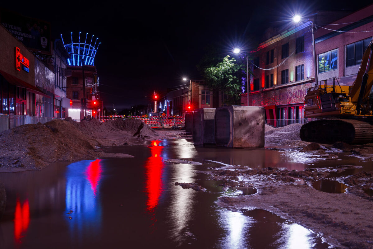 Flooded road construction on Hennepin Avenue in Uptown Minneapolis.