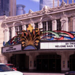 GO TWOLVES 1 "GO TWOLVES" and "WELCOME BACK TO MN CHUCK" on the marquee of the State Theatre in downtown Minneapolis.
