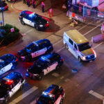 Outside the Hennepin County Medical Center tonight in downtown Minneapolis as Minneapolis police officer Jamal Mitchell, killed in today's mass shooting, is escorted by hundreds of officers to the medical examiner's office in Minnetonka.