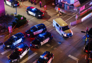 Outside the Hennepin County Medical Center tonight in downtown Minneapolis as Minneapolis police officer Jamal Mitchell, killed in today's mass shooting, is escorted by hundreds of officers to the medical examiner's office in Minnetonka.