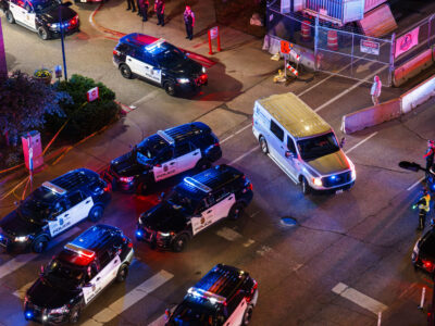 Minneapolis Police Escort Officer Jamal Mitchell to Medical Examiner