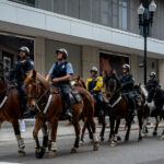 Mounted Patrol in downtown Minneapolis during a Minnesota Timberwolves Western Conference Finals playoff game.