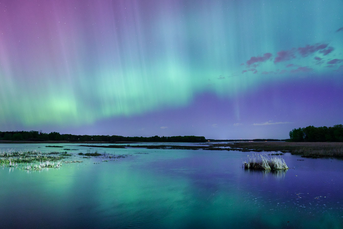 Northern lights over a Minnesota lake in May 2024