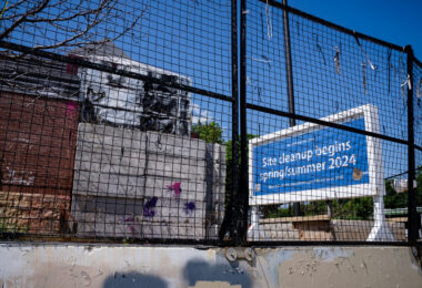 New banners up as we near the 4th anniversary of protesters burning the Minneapolis police third precinct police station. After no major site activity since 2020, the city says they're going to begin site cleanup and take fencing down.