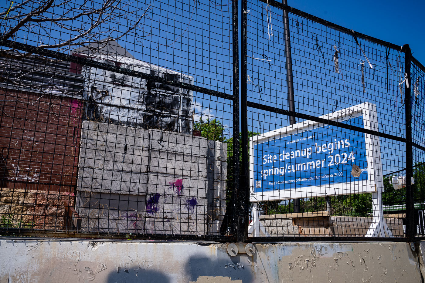 Site cleanup banners at former third precinct