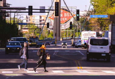 Walking across Hennepin Avenue in Downtown Minneapolis.