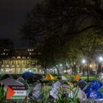 The anti-war protest encampment at the University of Minnesota in Minneapolis on May 1st, 2024. At the same time, some protesters were continuing to talk with school officials regarding their demands. Shortly after 10pm the school sent out a message that an initial agreement had been reached. Tents were removed on May 2nd.This is the second encampment at the university following the police clearing and arresting 9 protesters last week. Among the protesters demands are that the school “divest from all companies complicit in war crimes and human rights violations.