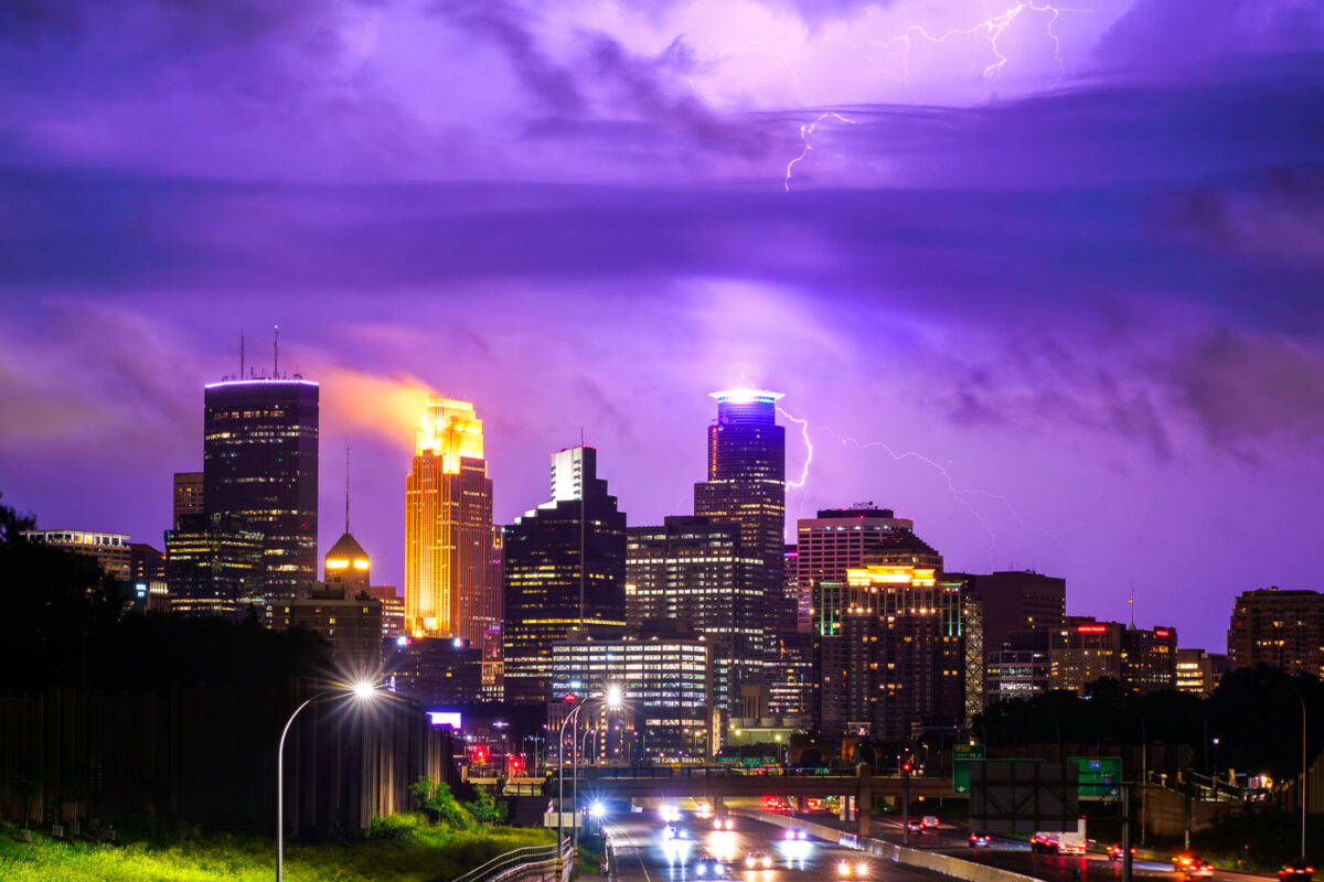 A lightning bolt hits downtown Minneapolis as storms move to the north of the city.