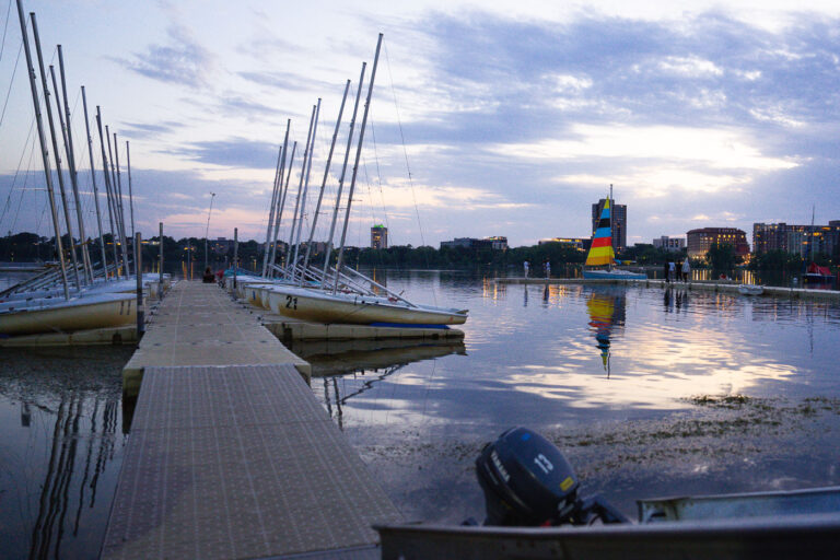 Dock and boats at Bde Maka Ska 2 Boats on Bde Maka Ska in Minneapolis in June 2024.